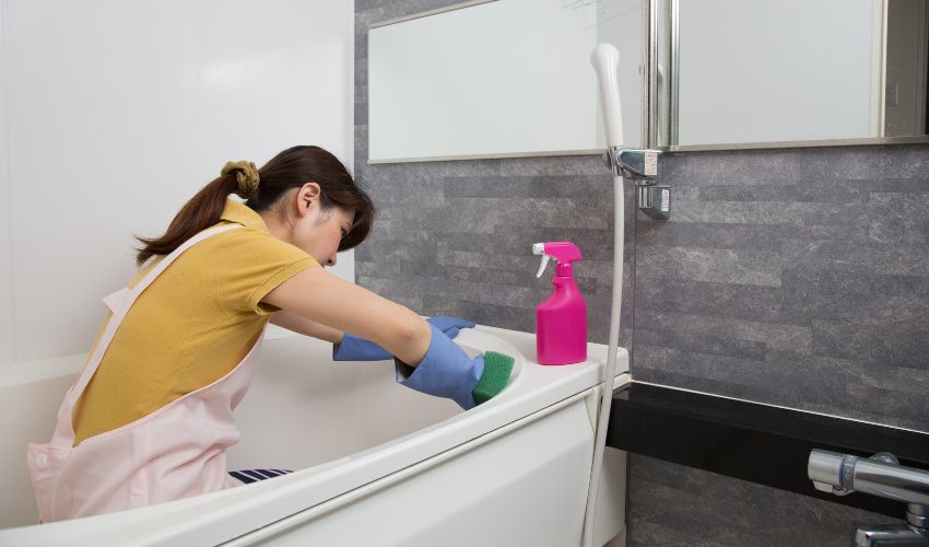 Apply Commercial Cleaner To The Shower & Bathtub